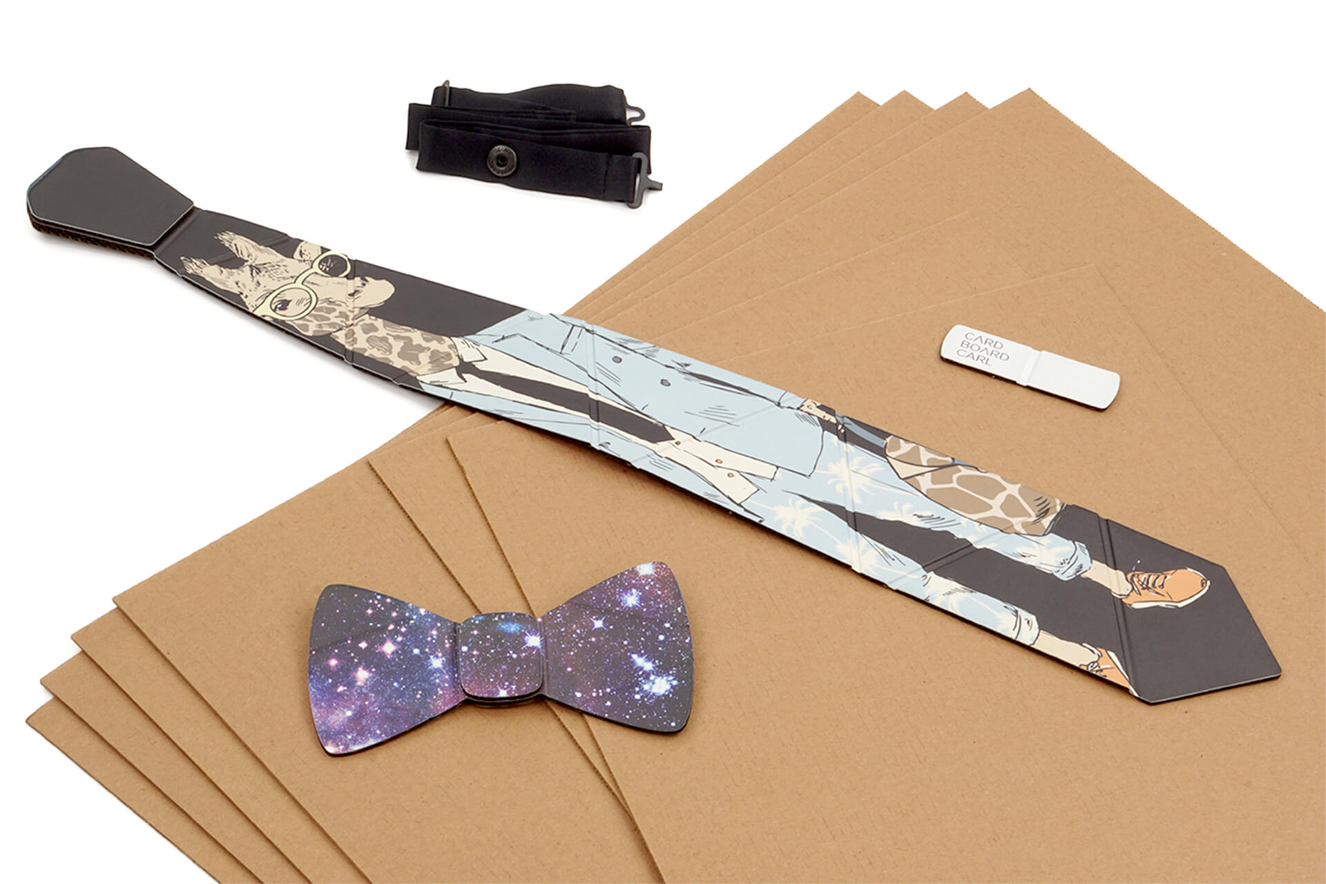 A cardboard neck tie and bow tie resting on cardboard sheets